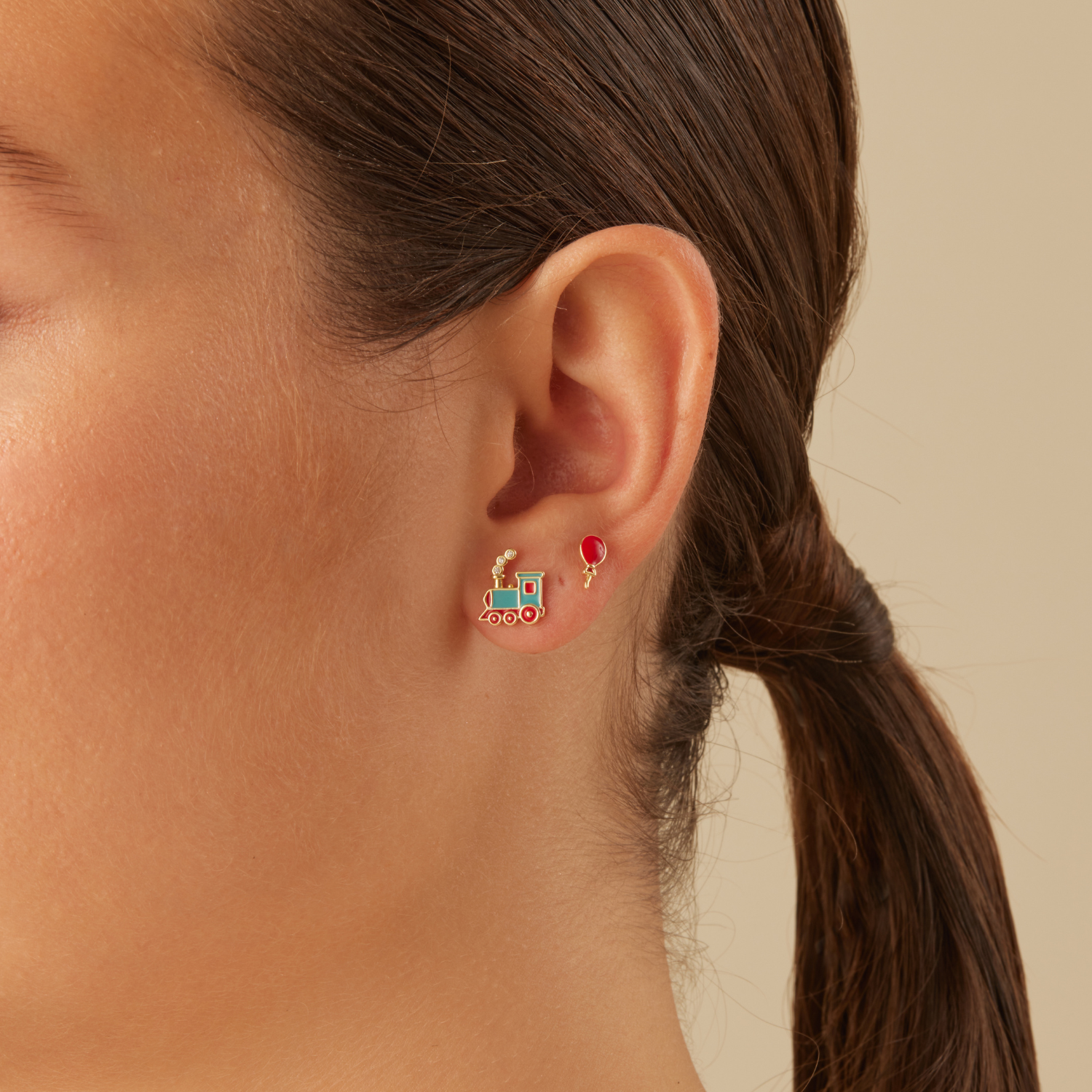 PENDIENTE PIERCING TOY TRAIN